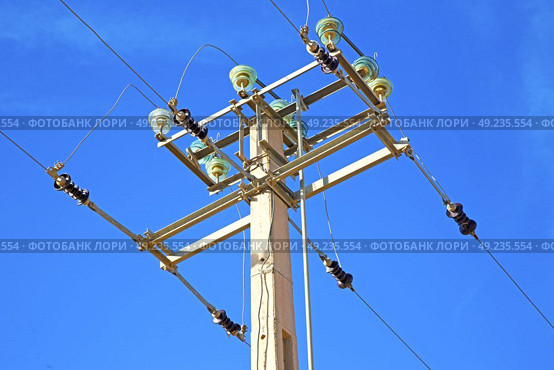   utility pole in africa morocco energy and distribution pylon. Стоковое фото, агентство Ingram Publishing / Фотобанк Лори