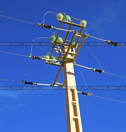   utility pole in africa morocco energy and distribution pylon. Стоковое фото, агентство Ingram Publishing / Фотобанк Лори