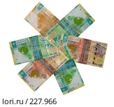 Денежные знаки Казахстана,  сложенные в виде звездочки (2008 год). Стоковое фото, фотограф Михаил Николаев / Фотобанк Лори