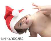 Маленькая девочка в новогоднем колпаке. Стоковое фото, фотограф Анна Игонина / Фотобанк Лори