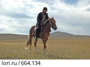 Житель Хужира на лошади (2004 год). Редакционное фото, фотограф Игнатьев Михаил / Фотобанк Лори