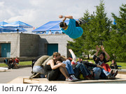 Трюк на роликовых коньках. Спортсмен в воздухе (2008 год). Редакционное фото, фотограф Александр Щепин / Фотобанк Лори