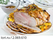 Мясо, запеченное в апельсиновом соусе. Стоковое фото, фотограф Лидия Рыженко / Фотобанк Лори