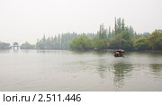Прогулки на лодках по озеру Сиху в Китае (2011 год). Стоковое фото, фотограф Владимир Чинин / Фотобанк Лори