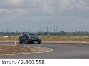 Спортивные автомобили участвующие в гонке Суперкаров (2011 год). Редакционное фото, фотограф Литвяк Игорь / Фотобанк Лори