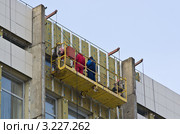 Утепление фасада здания. Стоковое фото, фотограф Аркадий Захаров / Фотобанк Лори