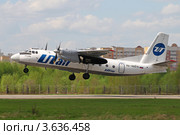 Самолет Ан-24 авиакомпании ЮтЭир (2012 год). Редакционное фото, фотограф Александр Тарасенков / Фотобанк Лори