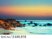 Каменистый морской берег на закате. Стоковое фото, фотограф Ольга Хорошунова / Фотобанк Лори