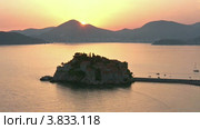Закат солнца и островок Свети-Стефан (Sveti Stefan). Черногория. (2012 год). Стоковое видео, видеограф Юрий Брыкайло / Фотобанк Лори