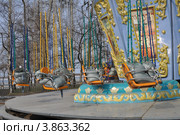 Мешки на карусели (2012 год). Редакционное фото, фотограф Кривошеева Светлана / Фотобанк Лори