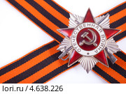Орден Отечественной войны на фоне перекрещенной георгиевской ленты. Стоковое фото, фотограф Литвяк Игорь / Фотобанк Лори