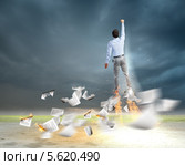 Бизнесмен со сверхчеловеческими способностями. Стоковое фото, фотограф Sergey Nivens / Фотобанк Лори