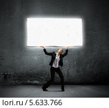 Непосильная ноша. Хрупкая девушка с огромным тяжелым камнем. Стоковое фото, фотограф Sergey Nivens / Фотобанк Лори