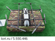 Международный авиационно-космический салон МАКС-2013. ZALA 421-22 - малогабаритный беспилотный летательный аппарат вертикального взлета и посадки вертолетного типа среднего радиуса действия ижевской компании ZALA AERO GROUP. Редакционное фото, фотограф Игорь Долгов / Фотобанк Лори