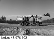 Строительство дороги на Северо-Хохряковское месторождение нефти в Западной Сибири (2012 год). Редакционное фото, фотограф Валерий Акулич / Фотобанк Лори