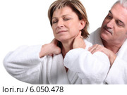 Man giving his wife a massage. Стоковое фото, фотограф Phovoir Images / Фотобанк Лори