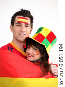 Couple supporting the Spanish football team. Стоковое фото, фотограф Phovoir Images / Фотобанк Лори