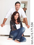 Couple in their living room. Стоковое фото, фотограф Phovoir Images / Фотобанк Лори