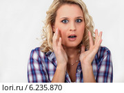woman having a big surprise. Стоковое фото, фотограф Phovoir Images / Фотобанк Лори