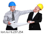 Engineer jealous of his colleague. Стоковое фото, фотограф Phovoir Images / Фотобанк Лори