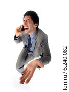 Hysterical businessman on the phone. Стоковое фото, фотограф Phovoir Images / Фотобанк Лори