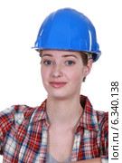 A nervous-looking tradeswoman. Стоковое фото, фотограф Phovoir Images / Фотобанк Лори