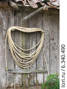 Hose attached to wooden hut. Стоковое фото, фотограф Phovoir Images / Фотобанк Лори
