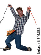 Man dazed by electric shock. Стоковое фото, фотограф Phovoir Images / Фотобанк Лори