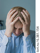 Males sore headache. Стоковое фото, агентство Ingram Publishing / Фотобанк Лори