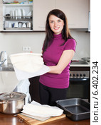 Girl cooking with prepared store-bought dough. Стоковое фото, фотограф Яков Филимонов / Фотобанк Лори