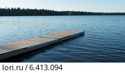 Boardwalk in a lake, Wasagaming, Riding Mountain National Park, Manitoba, Canada. Стоковое фото, агентство Ingram Publishing / Фотобанк Лори