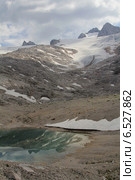 Ледниковое озеро у подножия Гальштаттского ледника (2150 m), пик Хоэр Дахштайн (Hoher Dachstein, 3004 m) (2014 год). Стоковое фото, фотограф Vladislav Osipov / Фотобанк Лори