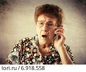 Seniors talking mobile phone. Стоковое фото, фотограф Гладских Татьяна / Фотобанк Лори