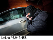 Car thief in a mask. Стоковое фото, фотограф Андрей Армягов / Фотобанк Лори
