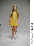 NEW YORK, NY - OCTOBER 19: A model walks the runway during the Bonnie Young preview at petitePARADE Kids Fashion Week at Bathhouse Studios on October 19, 2014 in New York City. Редакционное фото, фотограф Anton Oparin / Фотобанк Лори