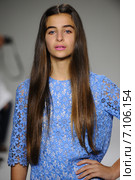NEW YORK, NY - OCTOBER 19: Celia Babini walks the runway during the Bonnie Young preview at petitePARADE Kids Fashion Week at Bathhouse Studios on October 19, 2014 in New York City. Редакционное фото, фотограф Anton Oparin / Фотобанк Лори