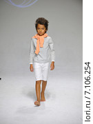 NEW YORK, NY - OCTOBER 19: A model walks the runway during the Charm preview at petitePARADE Kids Fashion Week at Bathhouse Studios on October 19, 2014 in New York City. Редакционное фото, фотограф Anton Oparin / Фотобанк Лори