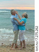 Senior couple on a beach. Стоковое фото, фотограф Ruslan Huzau / Фотобанк Лори