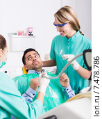 Upset client in dental clinic. Стоковое фото, фотограф Яков Филимонов / Фотобанк Лори