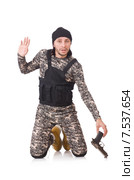 Young man in military uniform holding gun isolated on white. Стоковое фото, фотограф Elnur / Фотобанк Лори