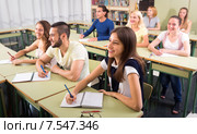 Happy students in college classroom. Стоковое фото, фотограф Яков Филимонов / Фотобанк Лори