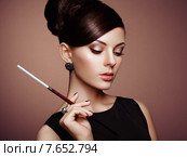 Portrait of beautiful sensual woman with elegant hairstyle. Стоковое фото, фотограф Oleg Gekman / Ingram Publishing / Фотобанк Лори