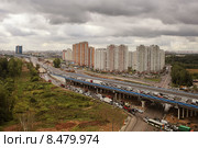 Поток машин на Дмитровском шоссе в районе "Северный" (2014 год). Редакционное фото, фотограф Манапова Екатерина / Фотобанк Лори