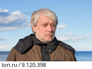 Portrait of middle-aged man at the sea. Стоковое фото, фотограф Roberts Ratuts / PantherMedia / Фотобанк Лори