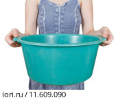 woman with green plastic basin isolated. Стоковое фото, фотограф Valery Vvoennyy / PantherMedia / Фотобанк Лори