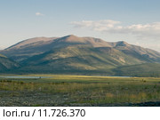 Последние лучи солнца касаются горных массивов. Стоковое фото, фотограф Ирина Бельдиман / Фотобанк Лори