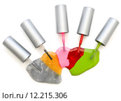photo of the multicolored liquid lacquer over white background. Стоковое фото, фотограф Sergej Razvodovskij / PantherMedia / Фотобанк Лори