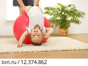 Baby boy on big ball. Стоковое фото, фотограф Ilka Erika Szasz-Fabian / PantherMedia / Фотобанк Лори