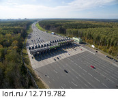 Платная объездная дорога «Северный обход Одинцово». Пункт взимания платы (ПВП-69) на платной дороге. (2015 год). Стоковое фото, фотограф Алексей А. Егоров / Фотобанк Лори