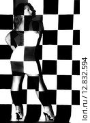 Beautiful woman covered with black and white squares. Стоковое фото, фотограф Art Konovalov / Фотобанк Лори